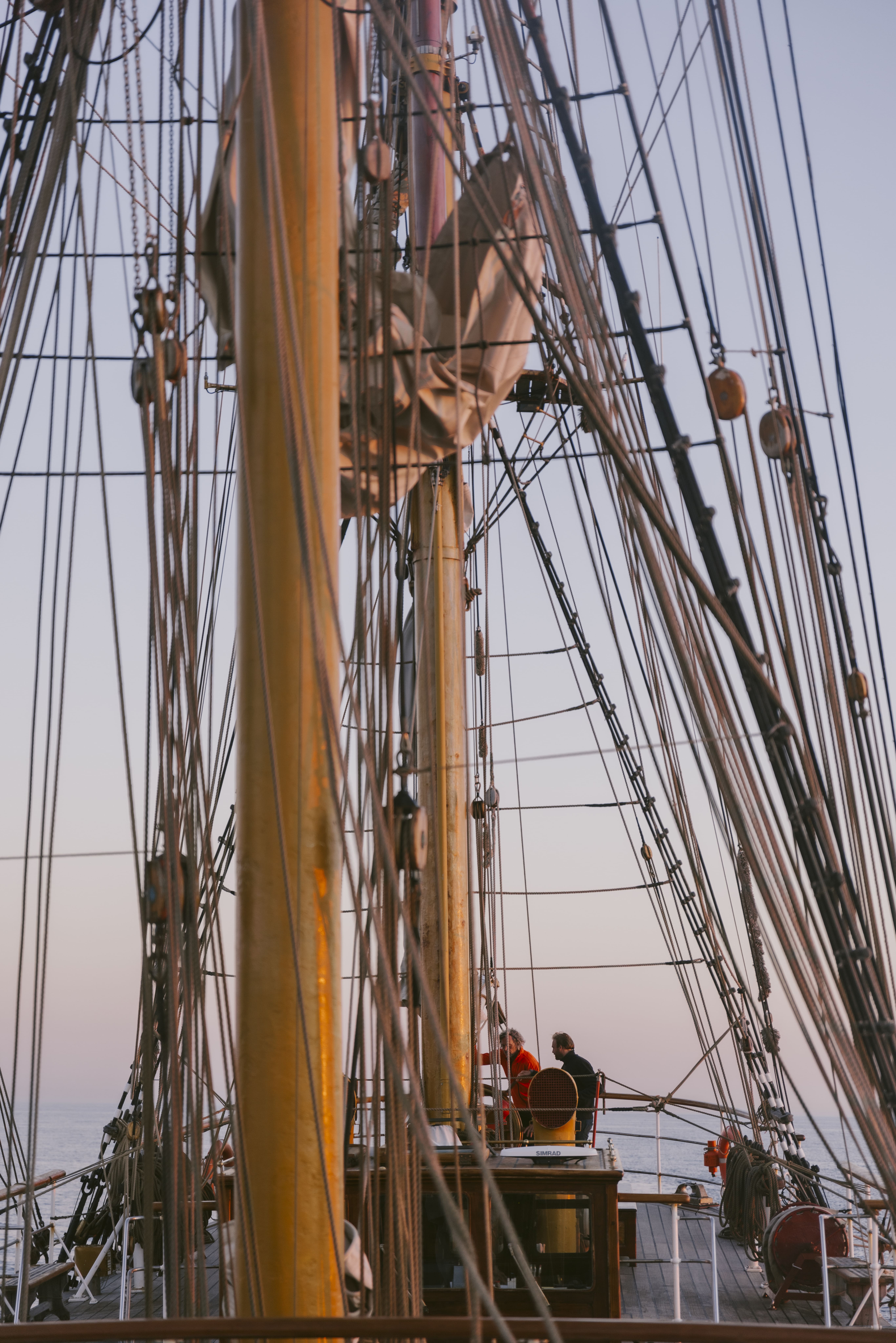 At the helm of Bark EUROPA at dusk